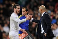 MADRID, SPAIN - JANUARY 09: Hat trick scorer Gareth Bale of Real Madrid shakes hands with Zinedine Zidane manager of Real Madrid as he is substituted during the La Liga match between Real Madrid CF and RC Deportivo La Coruna at Estadio Santiago Bernabeu on January 9, 2016 in Madrid, Spain. (Photo by Denis Doyle/Getty Images)
