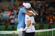 RIO DE JANEIRO, BRAZIL - AUGUST 14: Juan Martin Del Potro of Argentina embraces Andy Murray of Great Britain following the men's singles gold medal match on Day 9 of the Rio 2016 Olympic Games at the Olympic Tennis Centre on August 14, 2016 in Rio de Janeiro, Brazil. (Photo by Clive Brunskill/Getty Images)