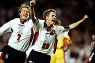 22 Jun 1998: Michael Owen of England celebrates with team mate David Beckham after scoring in the World Cup group G game against Romania at the Stade Municipal in Toulouse, France. England lost 2-1. \ Mandatory Credit: Ben Radford /Allsport