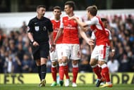 LONDON, ENGLAND - APRIL 30: Laurent Koscielny of Arsenal and Nacho Monreal of Arsenal plead with referee Michael Oliver after he awards Tottenham Hotspur a penalty during the Premier League match between Tottenham Hotspur and Arsenal at White Hart Lane on April 30, 2017 in London, England. (Photo by Julian Finney/Getty Images)
