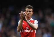 LONDON, ENGLAND - APRIL 30: Laurent Koscielny of Arsenal shows appreciation to the fans after the Premier League match between Tottenham Hotspur and Arsenal at White Hart Lane on April 30, 2017 in London, England. (Photo by Shaun Botterill/Getty Images)