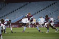 BIRMINGHAM, ENGLAND- NOVEMBER 9: l-r Aly Cissokho, Gabriel Agbonlahor and Aaron Tshibola of Aston Villa warm up before the Premier League International Cup match between Aston Villa U23's and Celtic U23's at Villa Park on November 9, 2016 in Birmingham, England (Photo by Nathan Stirk/Getty Images)