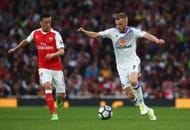 LONDON, ENGLAND - MAY 16: Mesut Ozil of Arsenal puts pressure on Sebastian Larsson of Sunderland during the Premier League match between Arsenal and Sunderland at Emirates Stadium on May 16, 2017 in London, England. (Photo by Charlie Crowhurst/Getty Images)