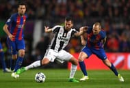 BARCELONA, SPAIN - APRIL 19: Miralem Pjanic of Juventus and Andres Iniesta of Barcelona battle for possession during the UEFA Champions League Quarter Final second leg match between FC Barcelona and Juventus at Camp Nou on April 19, 2017 in Barcelona, Spain. (Photo by Shaun Botterill/Getty Images)