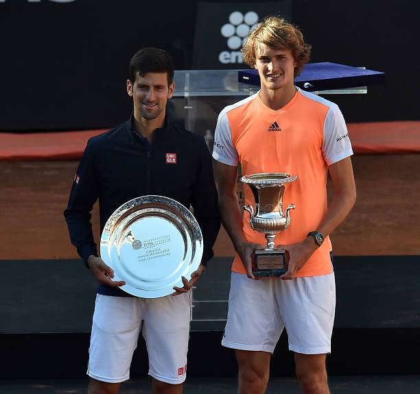 ROME, ITALY - MAY 21:  Novak Djokovic of Serbia and Alexander Zverev of Germany pose with the trophies after the ATP Singles Final match between Alexander Zverev of Germany and Novak Djokovic of Serbia during The Internazionali BNL d&#039;Italia 2017 - Day Eight at Foro Italico on May 21, 2017 in Rome, Italy.  (Photo by Giuseppe Bellini/Getty Images)