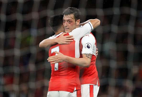 Twitter explodes as Mesut Ozil's record-breaking performance helps keep Arsenal's top 4 hopes alive