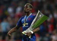 STOCKHOLM, SWEDEN - MAY 24: Paul Pogba of Manchester United celebrates with The Europa League trophy after the UEFA Europa League Final between Ajax and Manchester United at Friends Arena on May 24, 2017 in Stockholm, Sweden. (Photo by Dean Mouhtaropoulos/Getty Images)