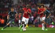 MANCHESTER, ENGLAND - MAY 11: Paul Pogba of Manchester United is chased by Nemanja Radoja of Celta Vigo during the UEFA Europa League, semi final second leg match, between Manchester United and Celta Vigo at Old Trafford on May 11, 2017 in Manchester, United Kingdom. (Photo by Gareth Copley/Getty Images)