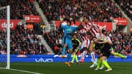 STOKE ON TRENT, ENGLAND - MAY 13: Peter Crouch of Stoke City scores his sides first goal past Petr Cech of Arsenal during the Premier League match between Stoke City and Arsenal at Bet365 Stadium on May 13, 2017 in Stoke on Trent, England. (Photo by Gareth Copley/Getty Images)