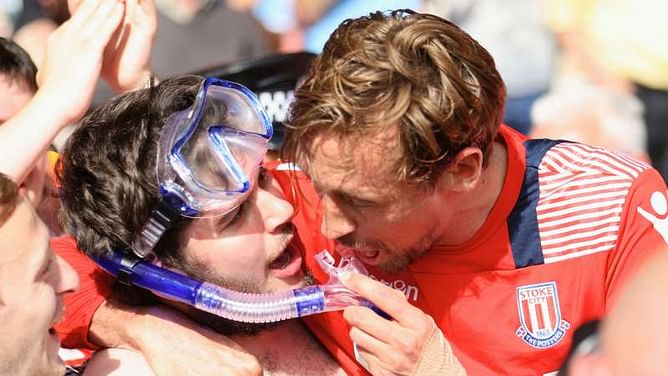 Crouch honours agreement with fan in swimming trunks