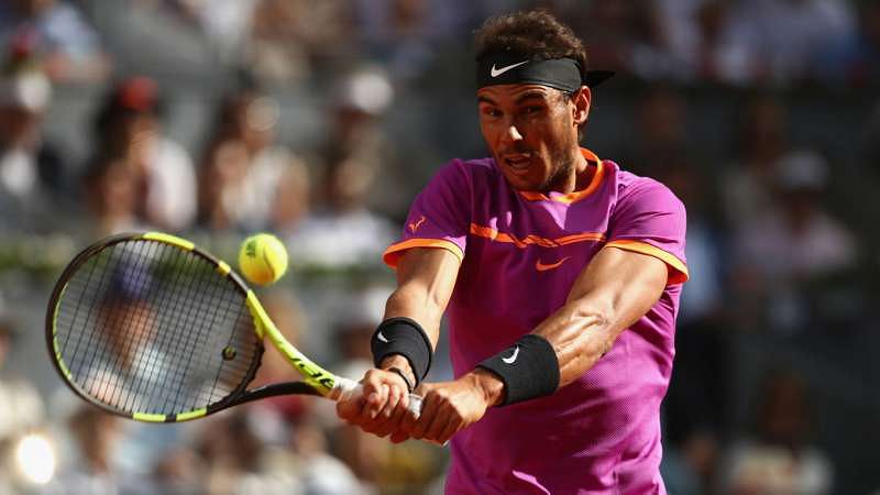 Early Almagro retirement sends Nadal through in Rome