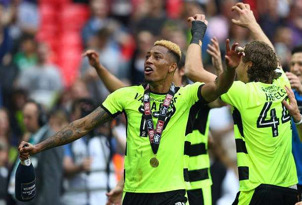 LONDON, ENGLAND - MAY 29:  Rajiv van La Parra of Huddersfield Town celebrates promotion to the Premier League after the Sky Bet Championship play off final between Huddersfield and Reading at Wembley Stadium on May 29, 2017 in London, England.  (Photo by Ian Walton/Getty Images)