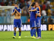 RIO DE JANEIRO, BRAZIL - JUNE 15: (L-R) Sead Kolasinac, Muhamed Besic and Anel Hadzic of Bosnia and Herzegovina react after losing to Argentina 2-1 during the 2014 FIFA World Cup Brazil Group F match between Argentina and Bosnia-Herzegovina at Maracana on June 15, 2014 in Rio de Janeiro, Brazil. (Photo by Jamie Squire/Getty Images)