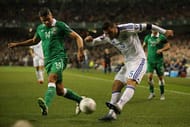 DUBLIN, IRELAND - NOVEMBER 16: Sead Kolasinac of Bosnia and Herzegovina crosses the ball under pressure from Jon Walters of the Republic of Ireland during the UEFA EURO 2016 Qualifier play off, second leg match between Republic of Ireland and Bosnia and Herzegovina at the Aviva Stadium on November 16, 2015 in Dublin, Ireland. (Photo by Ian Walton/Getty Images)