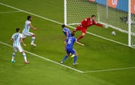 RIO DE JANEIRO, BRAZIL - JUNE 15: Sead Kolasinac of Bosnia and Herzegovina scores an own goal past goalkeeper Asmir Begovic as Ezequiel Garay and Federico Fernandez of Argentina look on during the 2014 FIFA World Cup Brazil Group F match between Argentina and Bosnia-Herzegovina at Maracana on June 15, 2014 in Rio de Janeiro, Brazil. (Photo by Clive Rose/Getty Images)