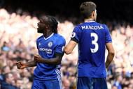 LONDON, ENGLAND - OCTOBER 15: Victor Moses of Chelsea (L) celebrates scoring his sides third goal with team mate Marcos Alonso of Chelsea (R) during the Premier League match between Chelsea and Leicester City at Stamford Bridge on October 15, 2016 in London, England. (Photo by Ian Walton/Getty Images)