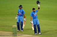 CANBERRA, AUSTRALIA - JANUARY 20: Virat Kohli of India celebrates his century during the Victoria Bitter One Day International match between Australia and India at Manuka Oval on January 20, 2016 in Canberra, Australia. (Photo by Mark Nolan/Getty Images)