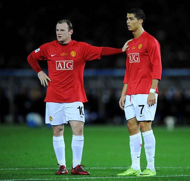 YOKOHAMA, JAPAN - DECEMBER 21: Wayne Rooney of Manchester United with team-mate Cristiano Ronaldo during the FIFA Club World Cup Japan 2008 Final match between Manchester United and Liga De Quito at the International Stadium Yokohama on December 21, 2008 in Yokohama, Kanagawa, Japan. (Photo by Shaun Botterill/Getty Images)
