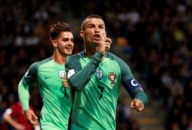 Two-goal Ronaldo leads Portugal to 3-0 win in Latvia