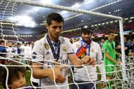 CARDIFF, WALES - JUNE 03: Alvaro Morata of Real Madrid cuts the net after the UEFA Champions League Final between Juventus and Real Madrid at National Stadium of Wales on June 3, 2017 in Cardiff, Wales. (Photo by Shaun Botterill/Getty Images)