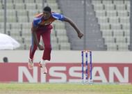 DHAKA, BANGLADESH - FEBRUARY 14: Alzarri Joseph of West Indies U19 bowls during the ICC U19 World Cup Final Match between India and West Indies on February 14, 2016 in Dhaka, Bangladesh. (Photo by Pal Pillai/Getty Images for Nissan)
