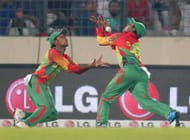 DHAKA, BANGLADESH - MARCH 28: Anamul Haque and Sohag Gazi of Bangladesh drop a catch in the outfield during the ICC World Twenty20 Bangladesh 2014 match between Bangladesh and India at Sher-e-Bangla Mirpur Stadium on March 28, 2014 in Dhaka, Bangladesh. (Photo by Scott Barbour/Getty Images)