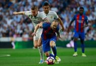 MADRID, SPAIN - APRIL 23: Andres Iniesta of Barcelona takes on Toni Kroos and Casemiro of Real Madrid during the La Liga match between Real Madrid CF and FC Barcelona at Estadio Bernabeu on April 23, 2017 in Madrid, Spain. (Photo by Gonzalo Arroyo Moreno/Getty Images)
