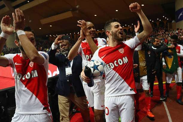 MONACO - MARCH 15:  Bernardo Silva of AS Monaco (with ball) celebrates victory with team mates Joao Moutinho and Fabinho after the UEFA Champions League Round of 16 second leg match between AS Monaco and Manchester City FC at Stade Louis II on March 15, 2017 in Monaco, Monaco. Monaco won by 3 goals to 1 and progress to the quarter finals on the away goals rule.  (Photo by Michael Steele/Getty Images)