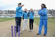 SCARBOROUGH, ENGLAND - AUGUST 21: Charlotte Edwards of England tosses the coin alongside Mithali Raj of India ahead of the 1st Royal London ODI between England and India at North Marine Road on August 21, 2014 in Scarborough, England. (Photo by Gareth Copley/Getty Images)