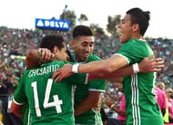 PASADENA, CA - JUNE 09: Chicharito #14 of Mexico celebrates his goal with Hector Herrera #16 and Hector Moreno #15 to take a 1-0 lead over Jamaica during Copa America Centenario at Rose Bowl on June 9, 2016 in Pasadena, California. (Photo by Harry How/Getty Images)