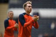 HULL, ENGLAND - MAY 21: Christian Eriksen of Tottenham Hotspur shows appreciation to the fans as he warms up prior to the Premier League match between Hull City and Tottenham Hotspur at the KC Stadium on May 21, 2017 in Hull, England. (Photo by Laurence Griffiths/Getty Images)