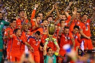 EAST RUTHERFORD, NJ - JUNE 26: Claudio Bravo #1 of Chile hoist the trophy after defeating Argentina to win the Copa America Centenario Championship match at MetLife Stadium on June 26, 2016 in East Rutherford, New Jersey. Chile defeated Argentina 4-2 in penalty kicks. (Photo by Mike Stobe/Getty Images)