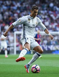MADRID, SPAIN - APRIL 23: Cristiano Ronaldo of Real Madrid CF runs with the ball during the La Liga match between Real Madrid CF and FC Barcelona at the Santiago Bernabeu stadium on April 23, 2017 in Madrid, Spain. (Photo by David Ramos/Getty Images)