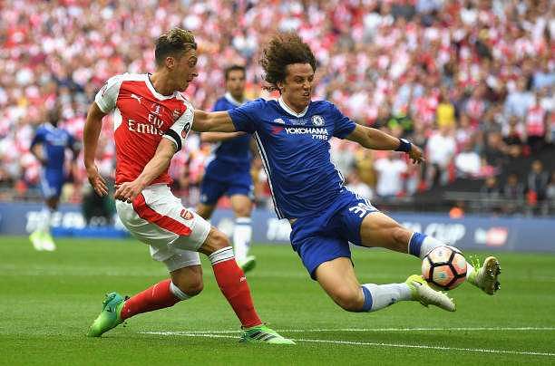 LONDON, ENGLAND - MAY 27:  David Luiz of Chelsea closes down Mesut Ozil of Arsenal during The Emirates FA Cup Final between Arsenal and Chelsea at Wembley Stadium on May 27, 2017 in London, England.  (Photo by Mike Hewitt/Getty Images)