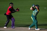 HOVE, ENGLAND - MAY 19: JP Duminy of South Africa hits out while Sussex wicket keeper Michael Burgess looks on during the Tour Match between Sussex and South Africa at The 1st Central County Ground on May 19, 2017 in Hove, England. (Photo by Charlie Crowhurst/Getty Images)
