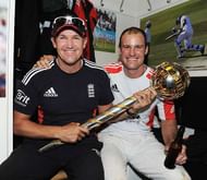 LONDON, ENGLAND - AUGUST 22: England coach Andy Flower (L) and captain Andrew Strauss celebrate the series victory with the ICC Test Championship Mace in the dressing room as England become the number one ranked team during day five of the 4th npower Test Match between England and India at The Kia Oval on August 22, 2011 in London, England. (Photo by Gareth Copley/Getty Images)