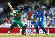 LONDON, ENGLAND - JUNE 18: Fakhar Zaman of Pakistan hits out while India's wicket keeper MS Dhoni looks on during the ICC Champions Trophy Final match between India and Pakistan at The Kia Oval on June 18, 2017 in London, England. (Photo by Charlie Crowhurst/Getty Images)