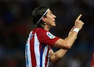 MALAGA, SPAIN - APRIL 01: Filipe Luis of Club Atletico de Madrid (L) celebrates after scoring the second goal for Club Atletico de Madrid during La Liga match between Malaga CF and Club Atletico de Madrid at La Rosaleda Stadium April 01, 2017 in Malaga, Spain. (Photo by Aitor Alcalde/Getty Images)