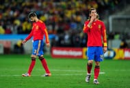 DURBAN, SOUTH AFRICA - JUNE 16: Gerard Pique and Sergio Ramos of Spain look dejected during the 2010 FIFA World Cup South Africa Group H match between Spain and Switzerland at Durban Stadium on June 16, 2010 in Durban, South Africa. (Photo by Jamie McDonald/Getty Images)