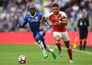 LONDON, ENGLAND - MAY 27: N'Golo Kante of Chelsea and Alex Oxlade-Chamberlain of Arsenal race for the ball during The Emirates FA Cup Final between Arsenal and Chelsea at Wembley Stadium on May 27, 2017 in London, England. (Photo by Laurence Griffiths/Getty Images)