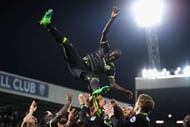 WEST BROMWICH, ENGLAND - MAY 12: N'Golo Kante of Chelsea is chucked in the air by team mates while celebrating winning the leauge title after the Premier League match between West Bromwich Albion and Chelsea at The Hawthorns on May 12, 2017 in West Bromwich, England. (Photo by Laurence Griffiths/Getty Images)