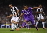 CARDIFF, WALES - JUNE 03: Gonzalo Higuain of Juventus and Casemiro of Real Madrid battle for possession during the UEFA Champions League Final between Juventus and Real Madrid at National Stadium of Wales on June 3, 2017 in Cardiff, Wales. (Photo by Shaun Botterill/Getty Images)