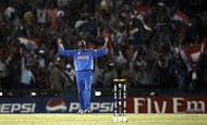 MOHALI, INDIA - MARCH 30: Harbhajan Singh of India celebrates after the dismissal of Shahid Afridi of Pakistan during the 2011 ICC World Cup second Semi-Final between Pakistan and India at Punjab Cricket Association (PCA) Stadium on March 30, 2011 in Mohali, India. (Photo by Graham Crouch/Getty Images)