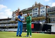LONDON, ENGLAND - JUNE 17: India captain Virat Kohli and Pakistan captain Sarfraz Ahmed hold the ICC Champions Trophy ahead of tomorrow's final at The Kia Oval on June 17, 2017 in London, England. (Photo by Gareth Copley/Getty Images)
