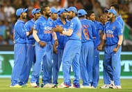 MELBOURNE, AUSTRALIA - JANUARY 17: India celebrate as Mitchell Marsh of Australia is run out by MS Dhoni of India during game three of the One Day International Series between Australia and India at the Melbourne Cricket Ground on January 17, 2016 in Melbourne, Australia. (Photo by Scott Barbour/Getty Images)