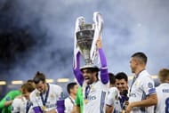 CARDIFF, WALES - JUNE 03: Isco of Real Madrid celebrates with The Champions League trophy after the UEFA Champions League Final between Juventus and Real Madrid at National Stadium of Wales on June 3, 2017 in Cardiff, Wales. (Photo by Matthias Hangst/Getty Images)