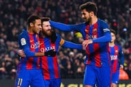 BARCELONA, SPAIN - JANUARY 26: Lionel Messi (C) of FC Barcelona celebrates with his team mates Neymar Jr. (L) and Andre Gomes after scoring from the penalty spot his team's second goal during the Copa del Rey quarter-final second leg match between FC Barcelona and Real Sociedad at Camp Nou on January 26, 2017 in Barcelona, Spain. (Photo by David Ramos/Getty Images)