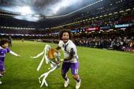 CARDIFF, WALES - JUNE 03: Marcelo of Real Madrid celebrates with The Champions League trophy after the UEFA Champions League Final between Juventus and Real Madrid at National Stadium of Wales on June 3, 2017 in Cardiff, Wales. (Photo by Laurence Griffiths/Getty Images)
