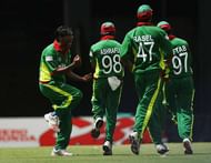 PORT OF SPAIN, TRINIDAD AND TOBAGO - MARCH 21: Mohammad Rafique of Bangladesh celebrates the wicket of Upal Tharanga of Sri Lanka during the ICC Cricket World Cup 2007 Group B match between Bangladesh and Sri lanka at the Queens Park Oval Cricket Ground on March 21, 2007 in Port of Spain, Trinidad. (Photo by Clive Rose/Getty Images)