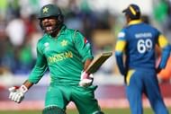 CARDIFF, WALES - JUNE 12: Sarfraz Ahmed of Pakistan celebrates hitting the winning runs and victory by 3 wickets as Sri Lanka captain Angelo Mathews (R) looks on during the ICC Champions Trophy match between Sri Lanka and Pakistan at the SWALEC Stadium on June 12, 2017 in Cardiff, Wales. (Photo by Michael Steele/Getty Images)